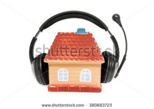 stock photo ceramic house with headphones on white background 380683723